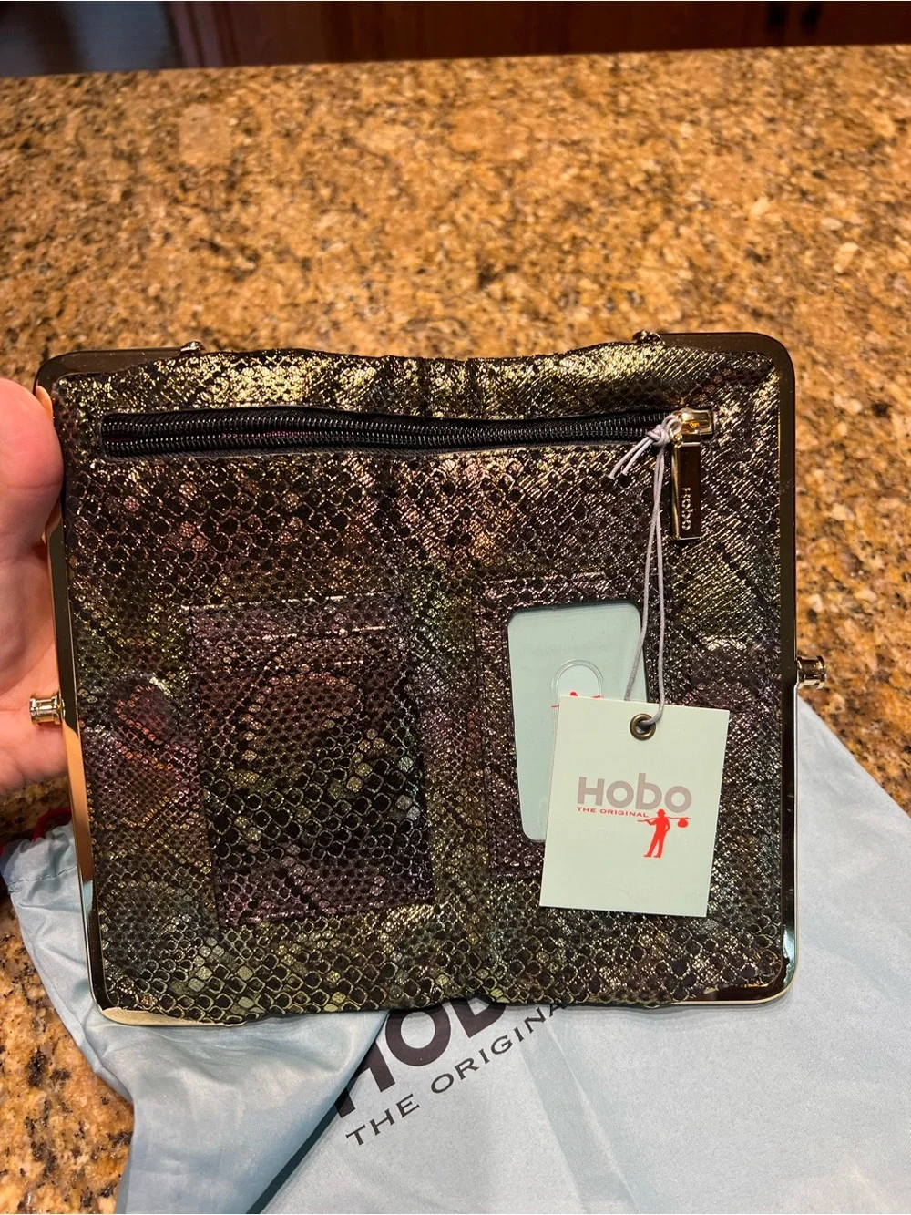 HOBO Iridescent Snake-Embossed Clutch in Brown and Black